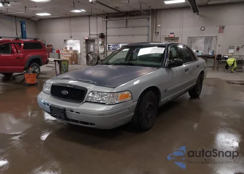 2003 Ford Crown Victoria Police z USA, uszkodzony, nr VIN 2FAFP71W23X123974